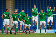 The Ireland team celebrate James Corcoran saving a penalty before he was sent off 14/5/2018