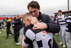Alexander Alderson celebrates with his father James Alderson after the game 12/3/2024