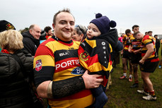 Thomas Gormley celebrates after the game with his son Tadhg 9/3/2024