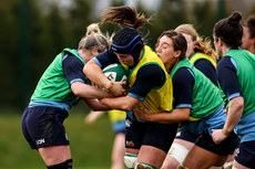 Brittany Hogan is tackled by Edel McMahon and Claire Boles 14/3/2024