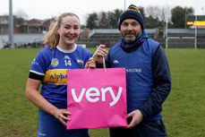 Eimear McGrath is presented with the Player of the Match award by manager Denis Kelly 9/3/2024