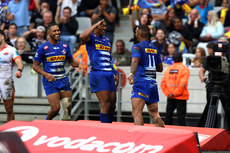DHL Stormers players celebrate with Leolin Zas after he scored the bonus point try 23/3/2024