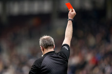 Johnny Murphy awards a red card to Conor Whelan 10/3/2024