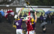 Eoin Ryan competes in the air for the ball 16/3/2024