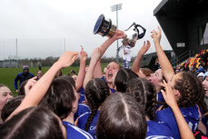 Aisling Cussen and her teammates celebrate with the trophy 13/3/2024
