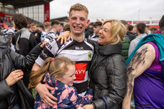 Alexander Alderson celebrates with his mother Jenny and sister Lucy after the game 12/3/2024