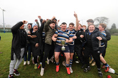 Alex Burke and teammates celebrate with the Conal Owens Cup 10/3/2024