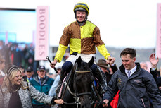 Paul Townend on Galopin Des Champs celebrates after winning 15/3/2024