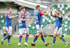 Linfield players celebrate their first goal from a Larne own goal 22/4/2024