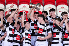 Tom Murray and his teammates celebrate with the trophy 20/3/2024