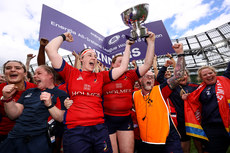 Nicole Cronin, Chloe Pearse and Fiona Reidy celebrate with the Division 1 trophy 28/4/2024