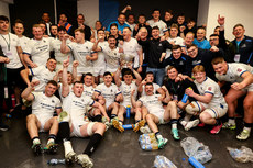 The Cork Constitution team celebrate in the changing room after the game with the Division 1A trophy 28/4/2024