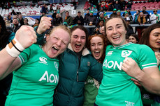 Aoife Wafer, Deirbhile Nic a Bháird and Eve Higgins celebrate after the game 27/4/2024