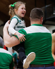 Cora Kelleher runs to her dad Paul Kelleher after the game 27/3/2024