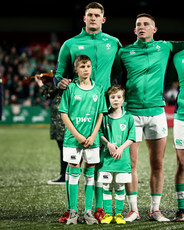 Evan O’Connell with mascots Mark O’Leary and Ciaran Holden 15/3/2024