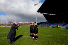 Photographer Michael Donnelly photographs the the match officials 2/3/2014