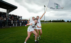 Louise Murphy, Anna Coburn and Hannah Merrick celebrate after the game 28/4/2024