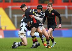 Frank Sheehan Williams is tackled by Luke Neenan and Conor McLoughlin 22/3/2023