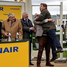 Dan Skelton is lifted in celebration after winning with  Protektorat 14/3/2024