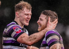 Alan Bennie is congratulated by Colm de Buitlear after scoring his side's fourth try of the match 25/3/2023
