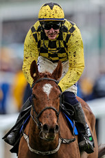 Paul Townend onboard State Man celebrates as he crosses the line to win 12/3/2024