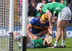 Ronan Maher and Limerick’s Aaron Gillane tend to an injured Peter Casey 28/4/2024