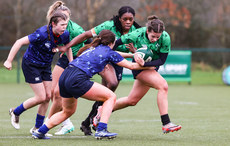 Molly Boote is tackled by Sarah Munnelly 13/3/2024