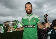 Ronan Sweeney celebrates with the cup and Man of the match award 26/10/2014