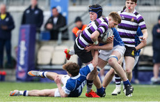 Ewan McGinty is tackled by Nicolas Sheehan and James Whitty 20/3/2024