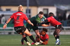 Cathal Forde is tackled by Jordan Hendrikse and Sanele Nohamba 23/3/2024
