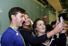 Paul O'Donovan poses for selfies with fans at Cork Airport 28/8/2016