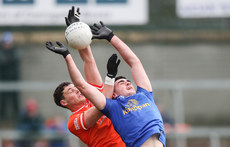 Aaron McKay challenges Ryan Donohoe for a high ball 16/3/2024