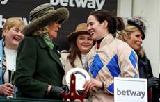 Queen Camilla Parker-Bowles presents Rachael Blackmore with a trophy after winning with Captain Guinness  13/3/2024