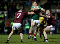Donal Vaughan is tackled by Johnny Heaney and Thomas Flynn  2/3/2019