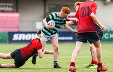 Adam Moore is tackled by Louis Murphy 14/3/2024