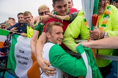 Gary O'Donovan celebrates with supporters after winning a silver medal with his brother Paul O'Donovan 12/8/2016