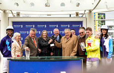 The winning connections are presented with the trophy after winning with Monmiral 14/3/2024