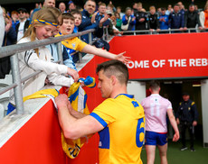 John Conlon signs autographs for supporters at the end of the game 28/4/2024