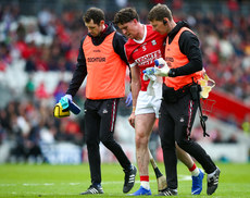 Tim O’Mahony is removed from the pitch by medical staff 28/4/2024