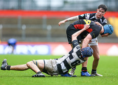 Darragh Leyden is tackled by Frankie Og Sheahan and Conor McLoughlin  22/3/2023