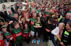 Keith Higgins celebrates with supporters as he raises The Nestor Cup 19/7/2015 