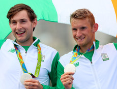 Gary and Paul O'Donovan celebrate winning silver medals 12/8/2016