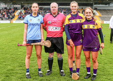 Karol Collins with Dublin's AnnaMarie Durkan and Wexford's Leagh Maddock and Karen Hayden 27/4/2024