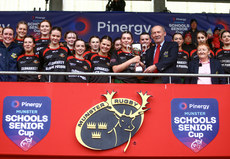 Emer Moroney is presented the trophy 13/3/2024