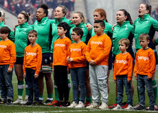 Molly Scuffil-McCabe, Grace Moore, Fiona Tuite, Sadhbh McGrath, Niamh O'Dowd, Sarah Delaney and Lauren Delany stand for the naitonal anthem 23/3/2024