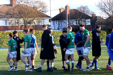 Players shake hands after the game 17/12/2022