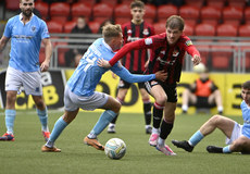 Harry Franklin and Ballymena’s Sean Brown 25/10/2024