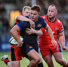 Paddy Harrison is tackled by Aled Davies and Ed Byrne 19/10/2024