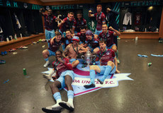 Drogheda United players celebrate in the dressing room 10/11/2024