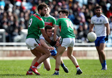 Conor McCarthy is tackled by Aidan O'Shea and Fergal Boland 24/3/2019